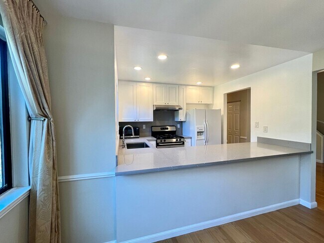 Building Photo - Great Natural light, Treetop Views with 2 Primary Suites plus OFFICE and a 2 car garage, It is li...