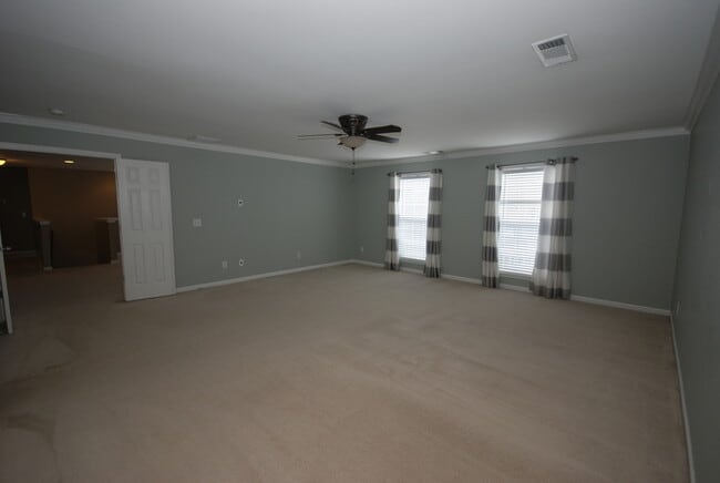 Building Photo - Oversized Executive Style Home with Finish...