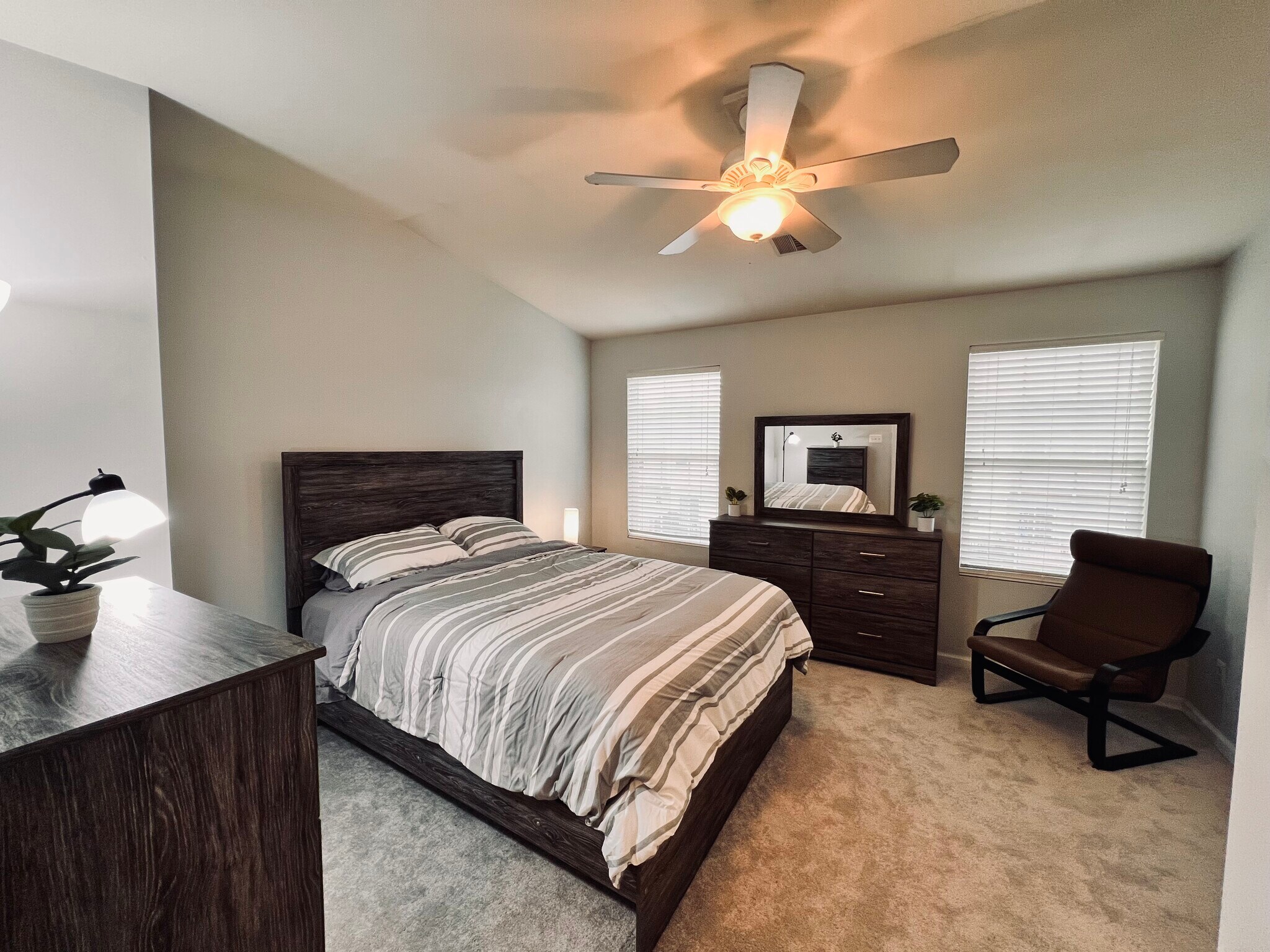 Primary bedroom with walk-in closet and full bathroom. Furnished. - 4148 Strawbridge Ct