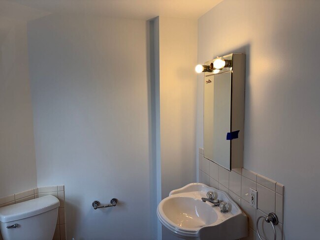 Building Photo - Elegant 3 Story Brick Corner Property Now Available