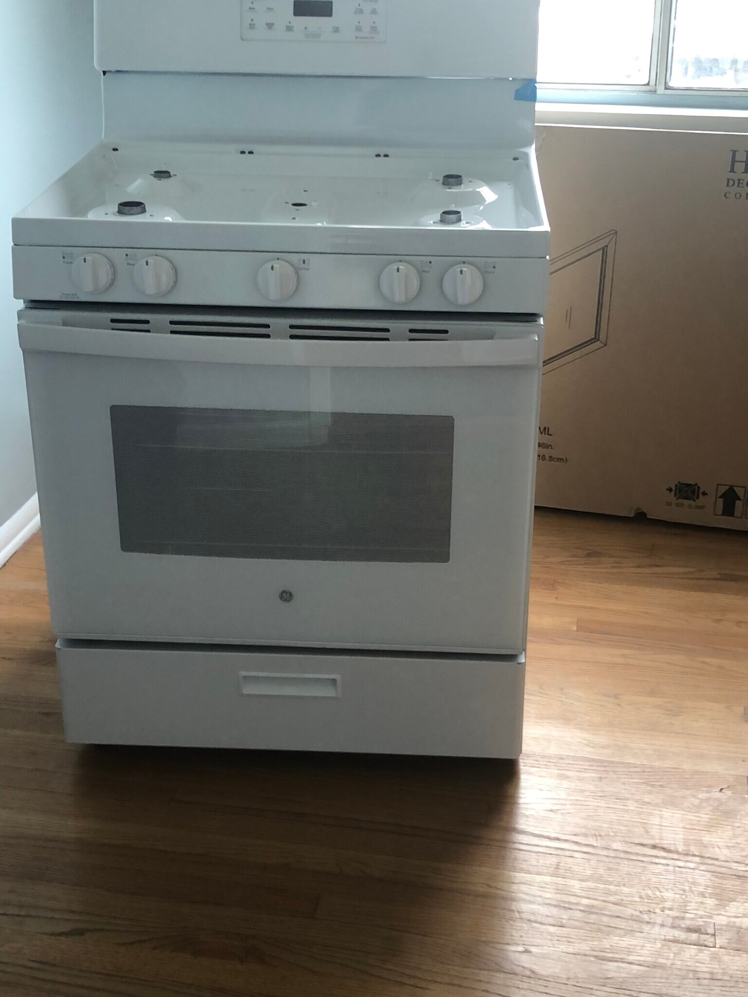 New gas range with overhead Microwave - 5727 S Corning Ave
