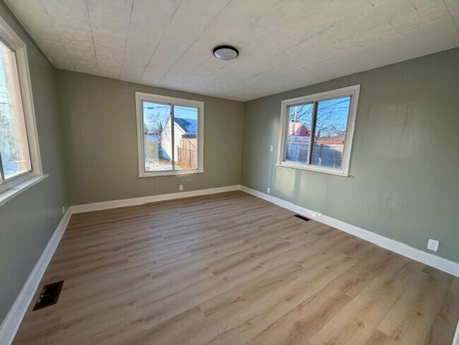 Building Photo - Three bedroom One and a half bath Brick Colonial home for lease