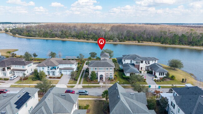Building Photo - Luxury Waterfront Pool Home in Laureate Park | 4BR + Water Views