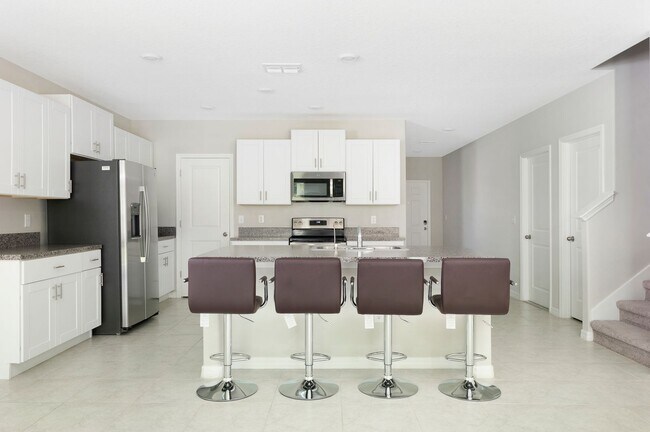 Building Photo - Spacious 5-Bed Touchstone Home – Primary Suite Downstairs, 2-Car Garage