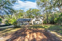 Building Photo - 212 Raintree Trail