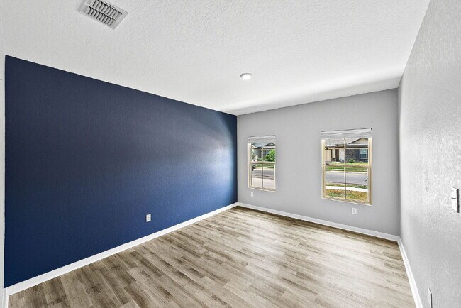 Building Photo - 4 Bedroom Corner Lot Rental with Spacious ...