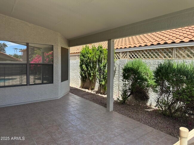 Building Photo - 8889 E Aster Dr