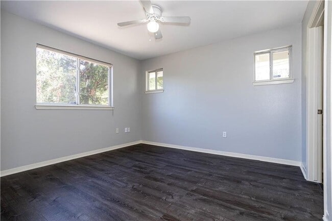 Building Photo - Stunning Renovation - New Hardwood flooring, tile in Kitchen. Granite countertops, breakfast bar