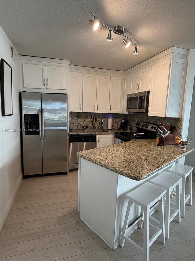 Building Photo - 5845 Collins Ave