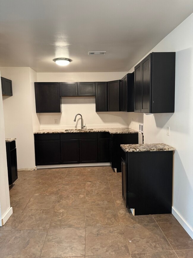 Building Photo - 4134 W 23rd Ave