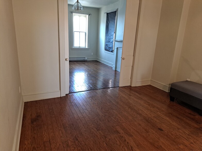 Main living spaces (2 rooms can be separated by pocket doors) - 224 N Potomac St