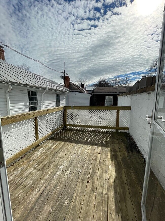 Building Photo - Small pets are welcome with an additional ...