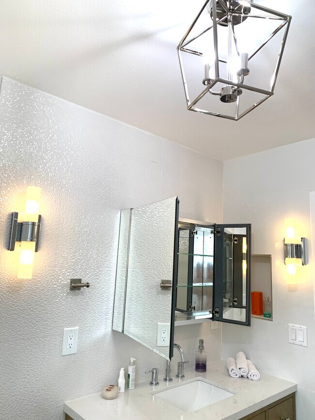 mirror cabinets and dimable sconces - 11138 Aqua Vista St