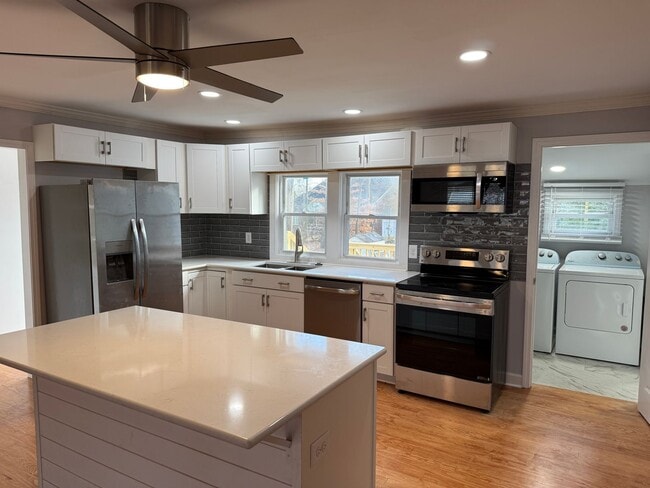 Building Photo - Renovated 3 bedroom 2 bathroom home with large yard