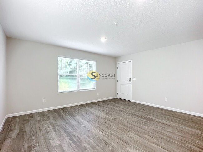 Building Photo - 6451 Breezy Oaks Way