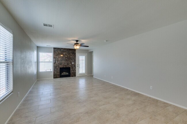 Building Photo - 2 bedroom + Den- Upgraded Flooring ready for immediate move in