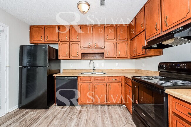 Building Photo - Welcome to your new Ellenwood haven!