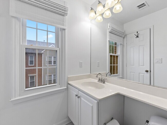 Building Photo - "Spacious 3-Bedroom Townhouse Retreat with...