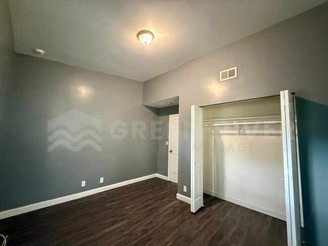 Building Photo - Fully Renovated 2BR Brick Home with Vaulted Ceilings & Backyard Retreat!
