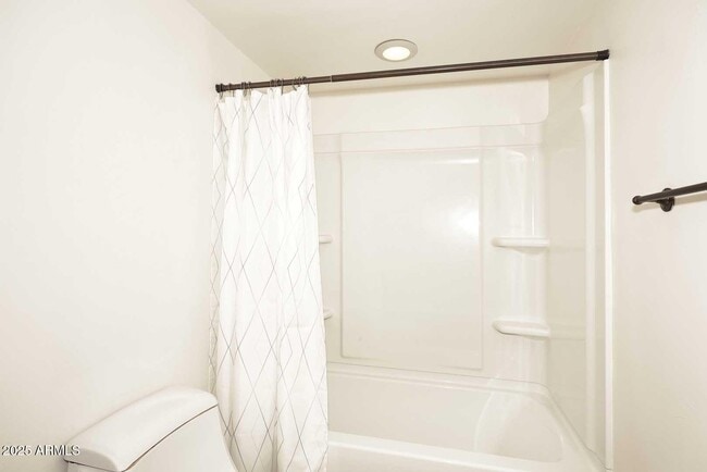 Building Photo - 7910 E Camelback Rd