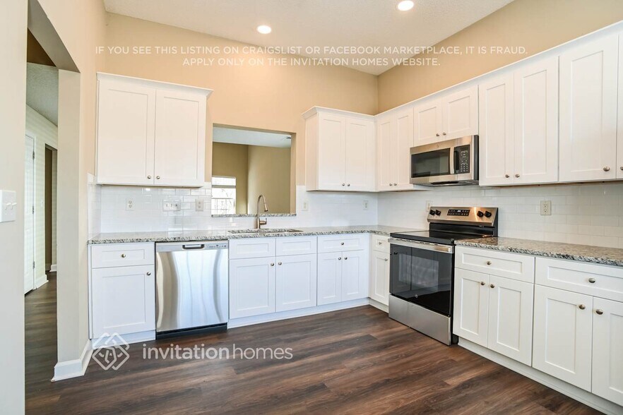 Building Photo - 6239 Day Lilly Ln