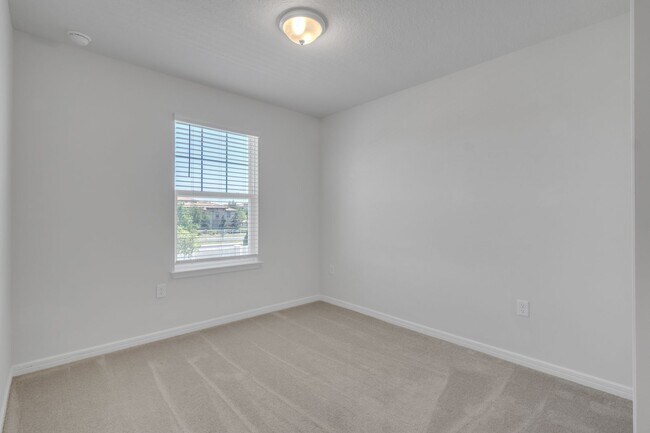 Building Photo - Luxurious Townhome in Lake Nona - A Perfec...