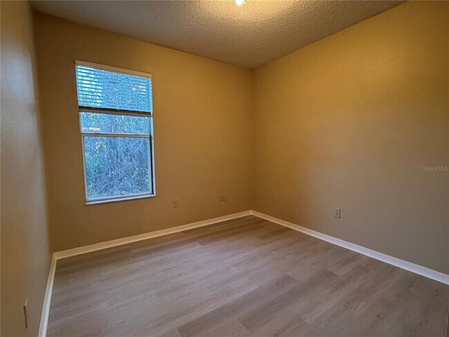 Building Photo - 8210 Whistling Pine Way