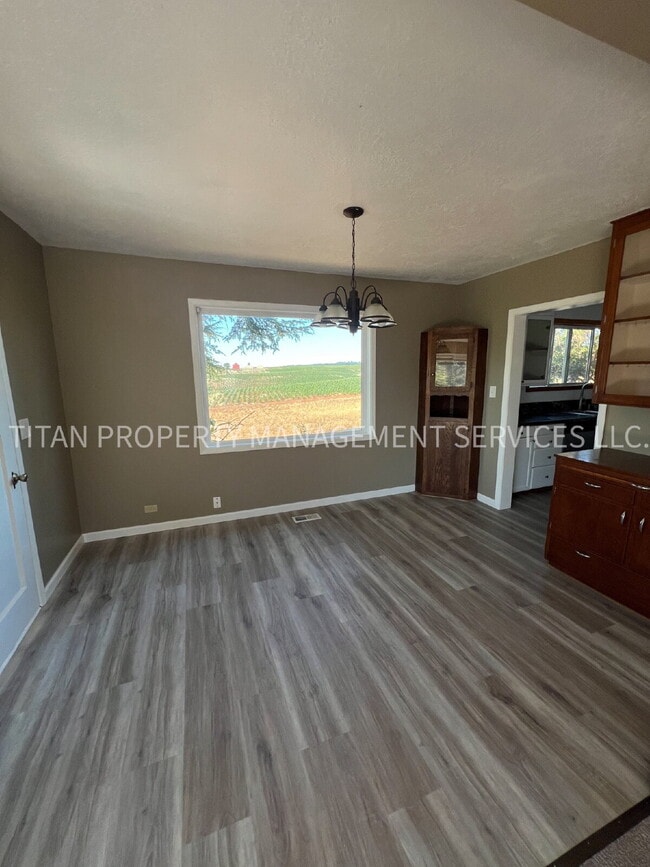 Building Photo - Spacious 4-Bed Farmhouse with 2.5 Baths on...
