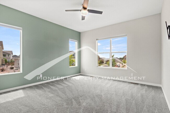 Building Photo - Elegant Ranch-Style Home with Main Floor Primary Bedroom with 3-Car Garage and Finished Basement ...