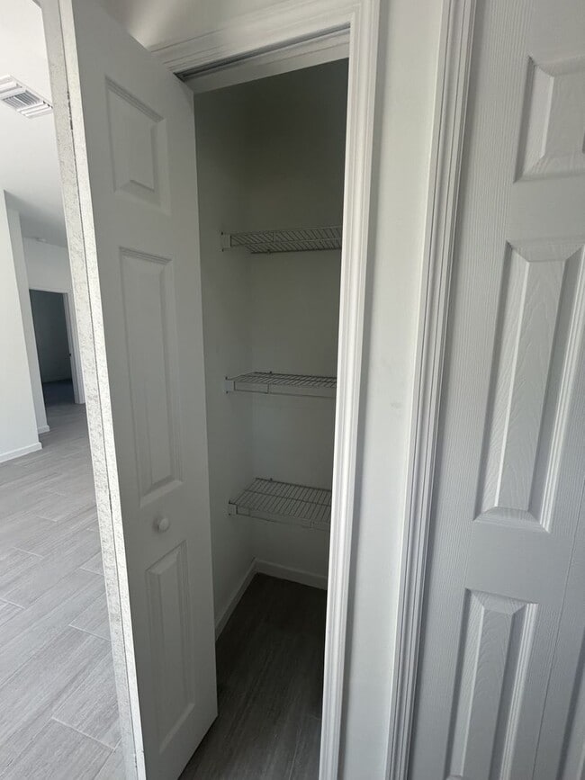 Building Photo - NEW CONSTRUCTION! Modern 3BR/2BA Home with Garage-Peaceful Lake Placid Location