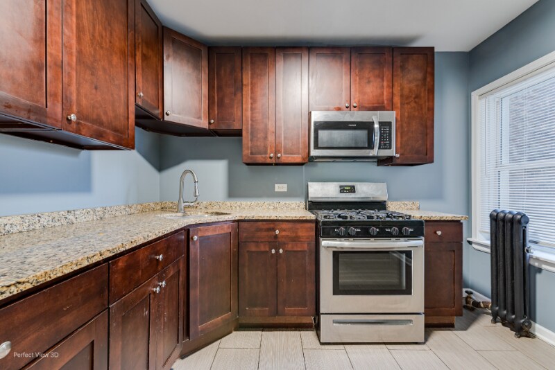 Building Photo - 6656 S Woodlawn Ave