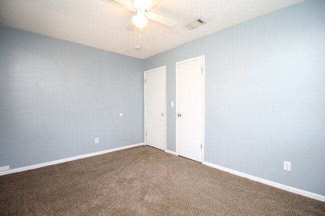 Building Photo - Spacious 3BR/1.5BA Home in Pace with Open Living Area, Tiled Family Room, and Fenced Backyard – M...