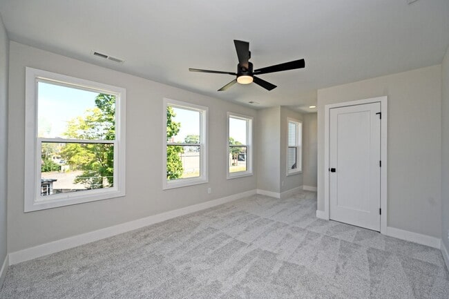 Building Photo - Stylish, Sustainable & Low-Maintenance Liv...