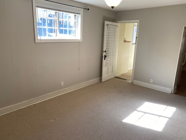 Living room off entryway and kitchen - 225 N Franklin St