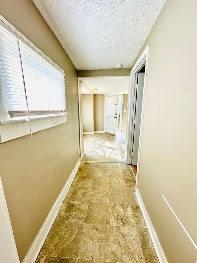 Building Photo - 2BR Corner lot house now available near Ch...