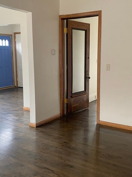 blue door leads to balcony, open door lead to stair. Photo taken from dinning room - 2550 N 45th St