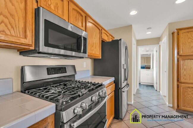 Building Photo - 5-Bedroom Residence Ready for Immediate Move-In