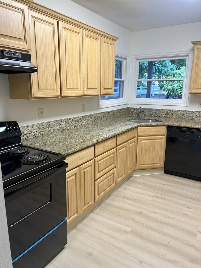 kitchen back to living room - 4662 Carman Dr