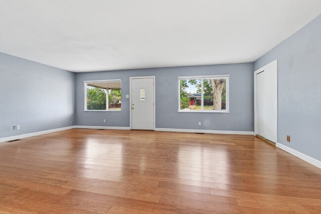 Building Photo - $3,045.95, 3 bed, 2 bath house in Denver with Fenced in Yard and In Unit Laundry!