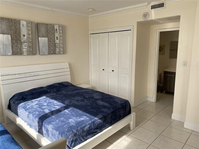 Building Photo - 10185 Collins Ave