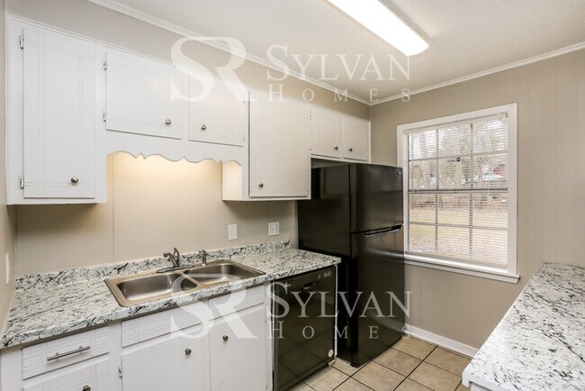 Building Photo - Lease today! No extra charge for contentme...