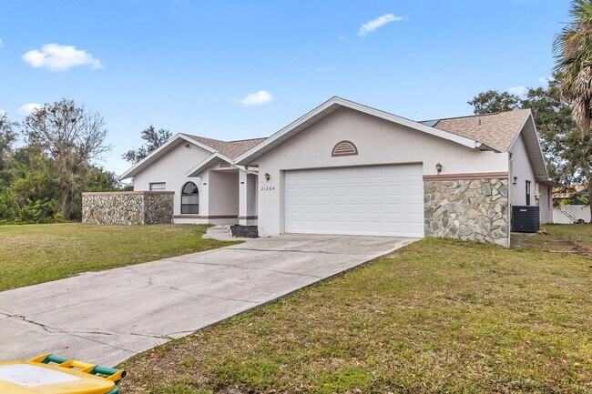 Building Photo - Annual ** 4 Bed / 3 Bath Single Family Home -- $1,950/month