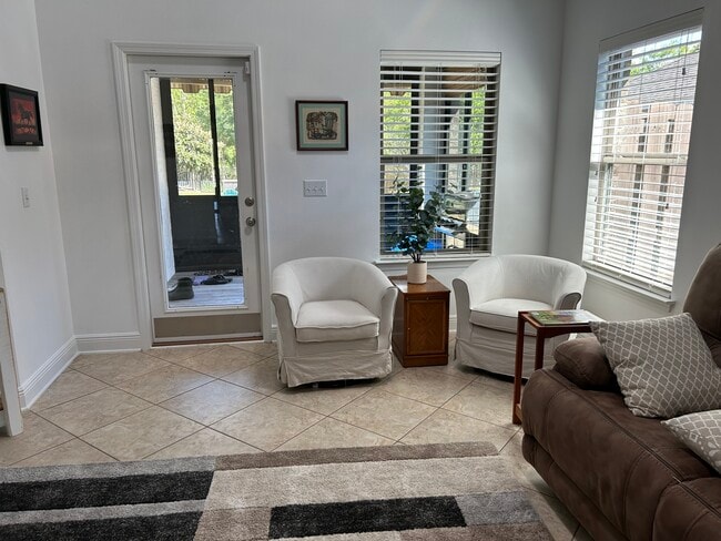 Living room and Sunroom - 11 Hemingway Ln
