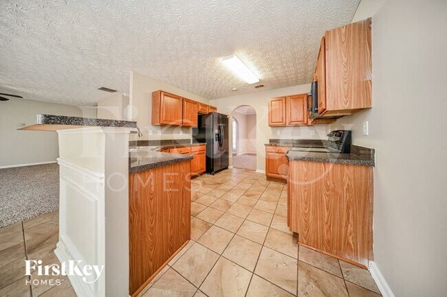 Building Photo - 6496 Snowden Dr