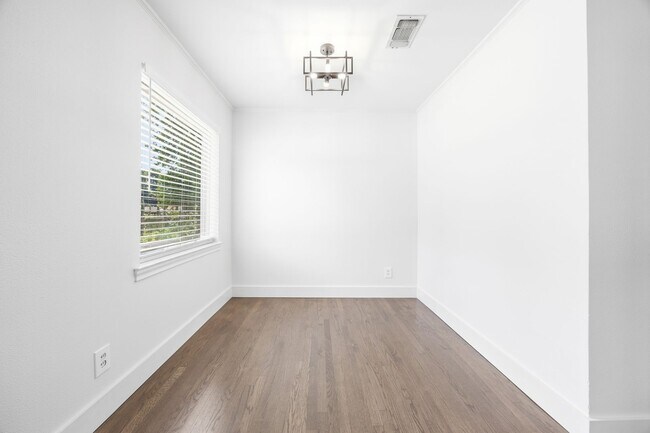 Building Photo - **$40K+ IN UPGRADES AND A FENCED BACKYARD WITH TWO STORAGE BUILDINGS**