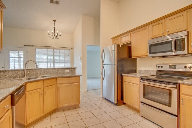 Building Photo - Updated 4BR/3BA Brick Home Near NAS Pensacola with Office & Screened Porch