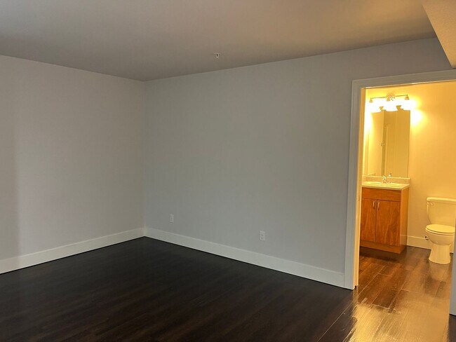 Building Photo - Yesler Place | Top Floor 0BD/1BA New Floor...