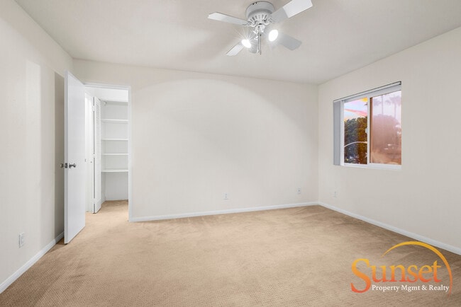 Building Photo - 7565 Charmant Dr