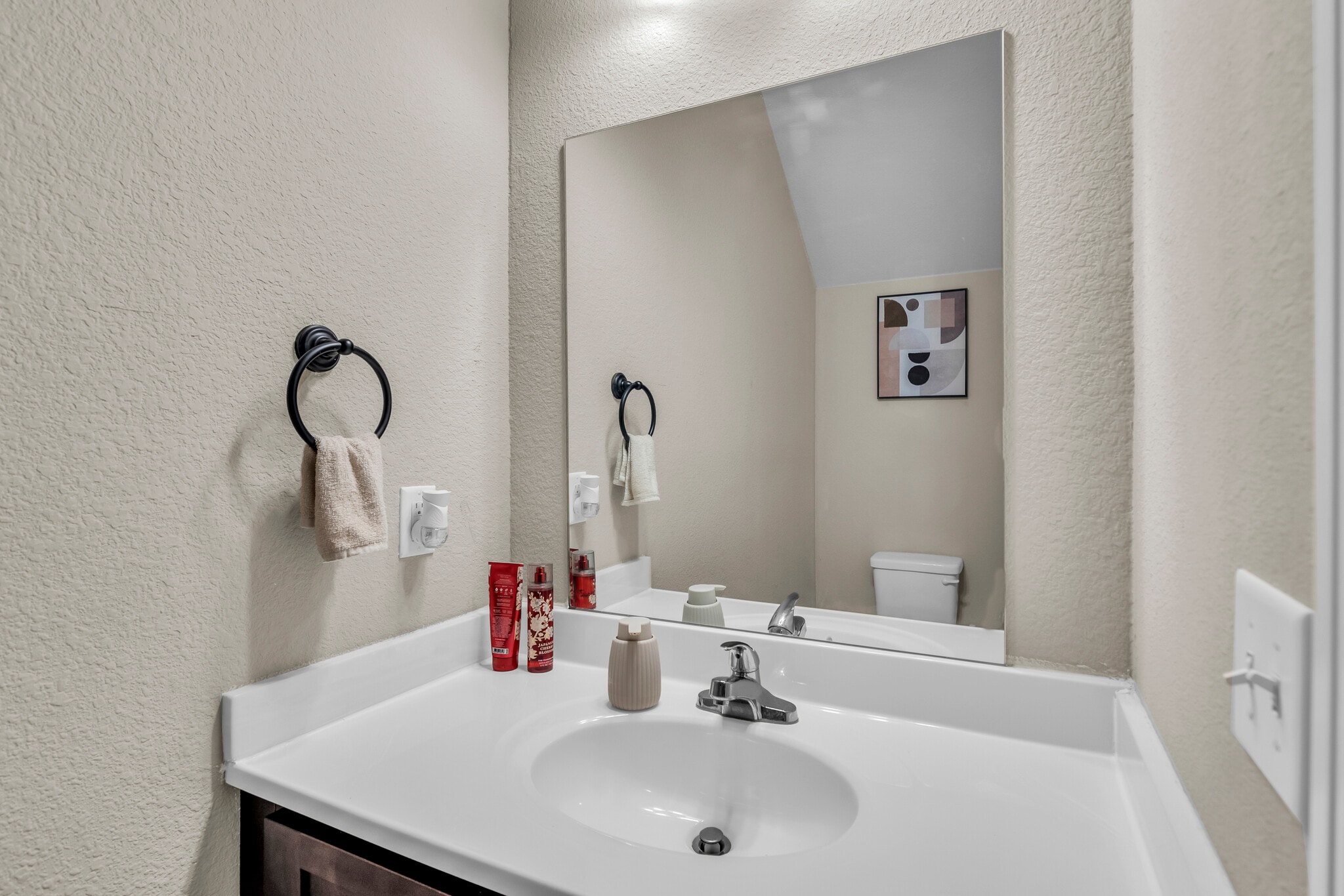HALF BATHROOM - 9413 N Adrian Ave