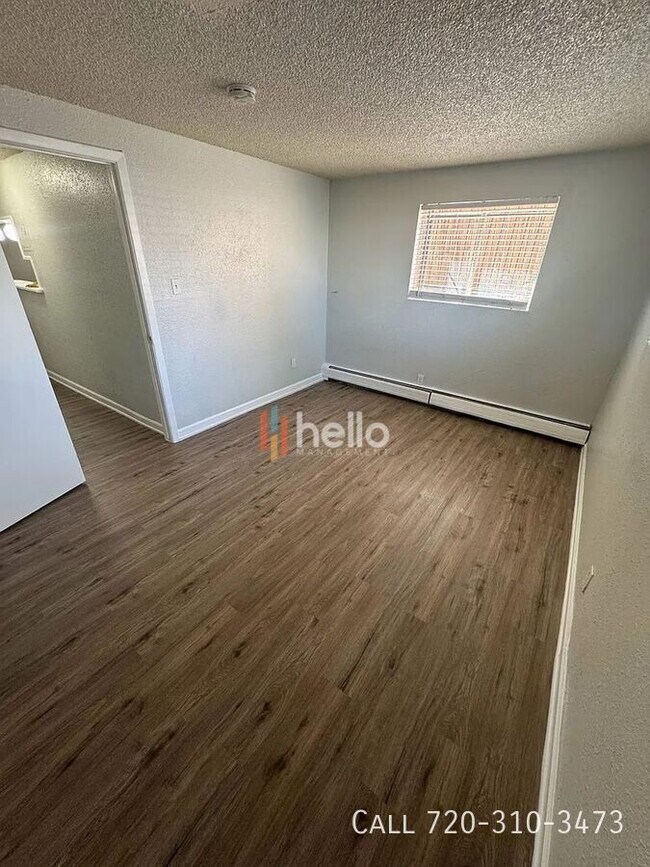 Building Photo - 9504 East 17th-102